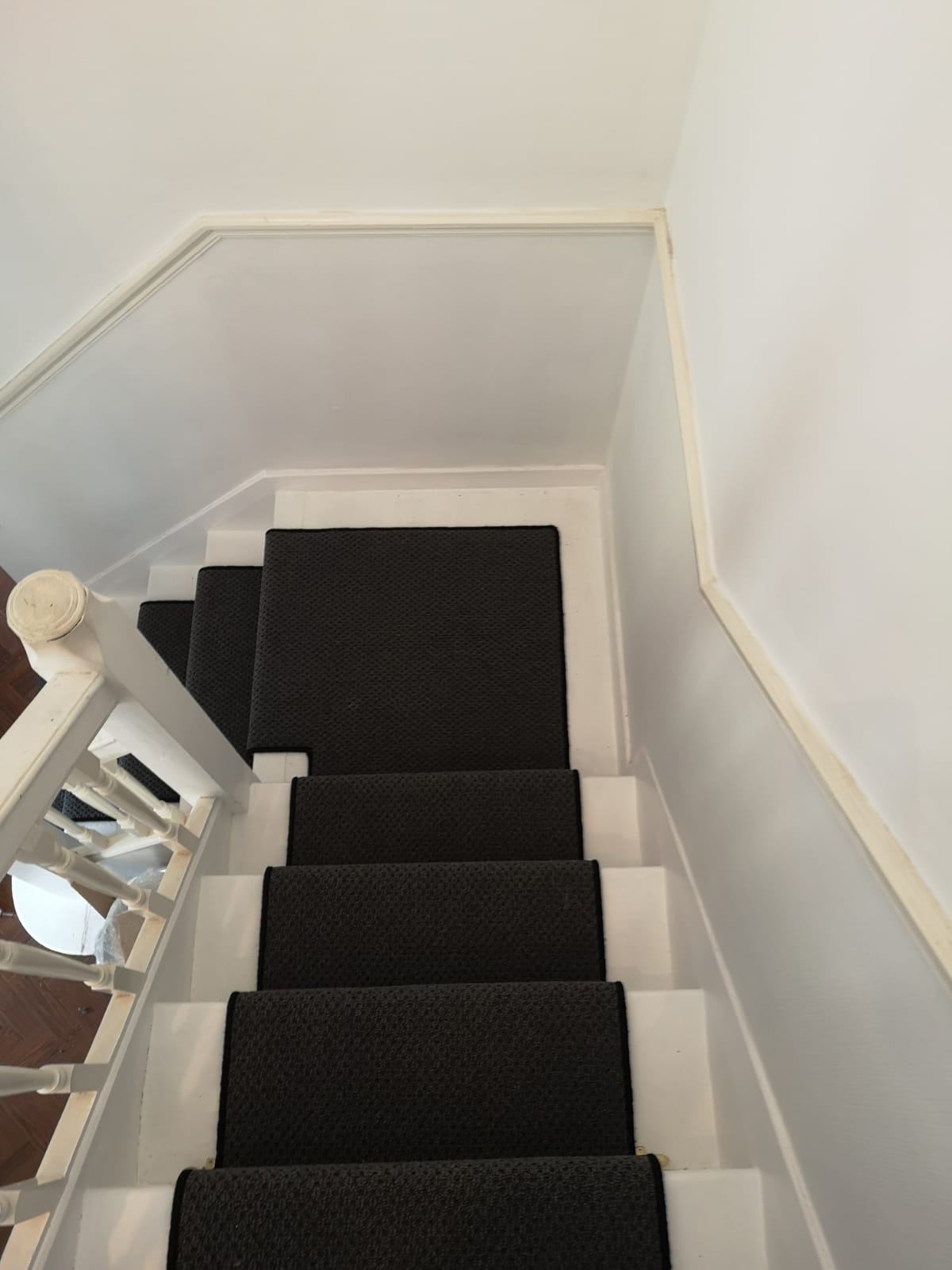 Stair runner with brass bars